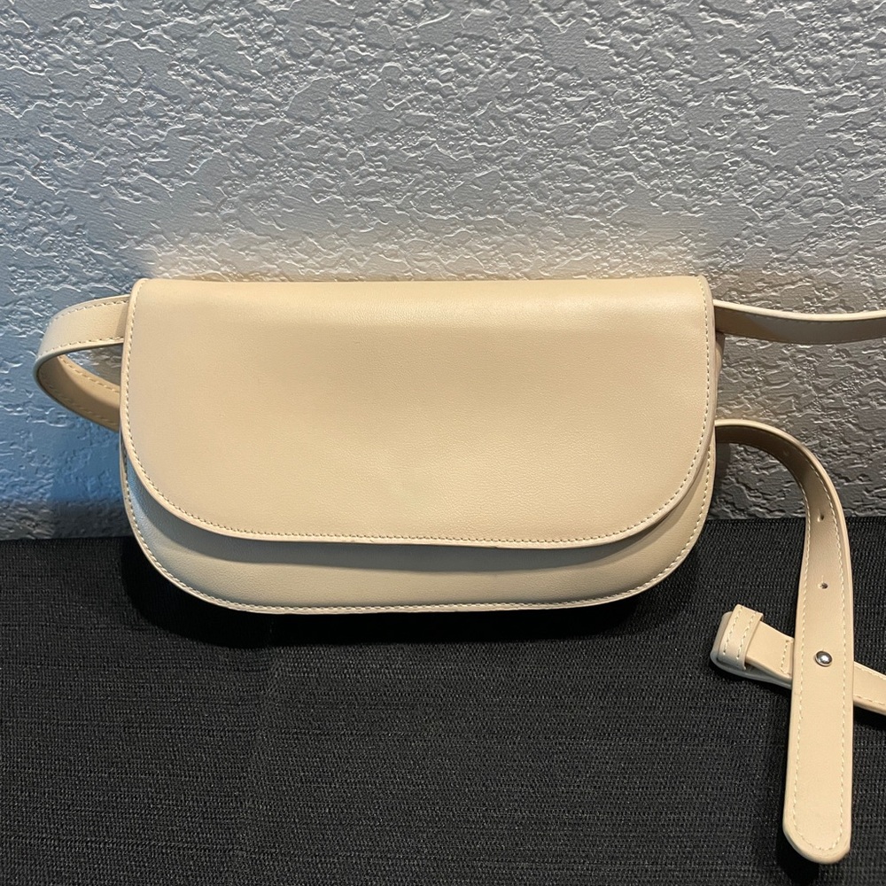 Melie Bianco 100% polyester cross body bag shade cold is bone